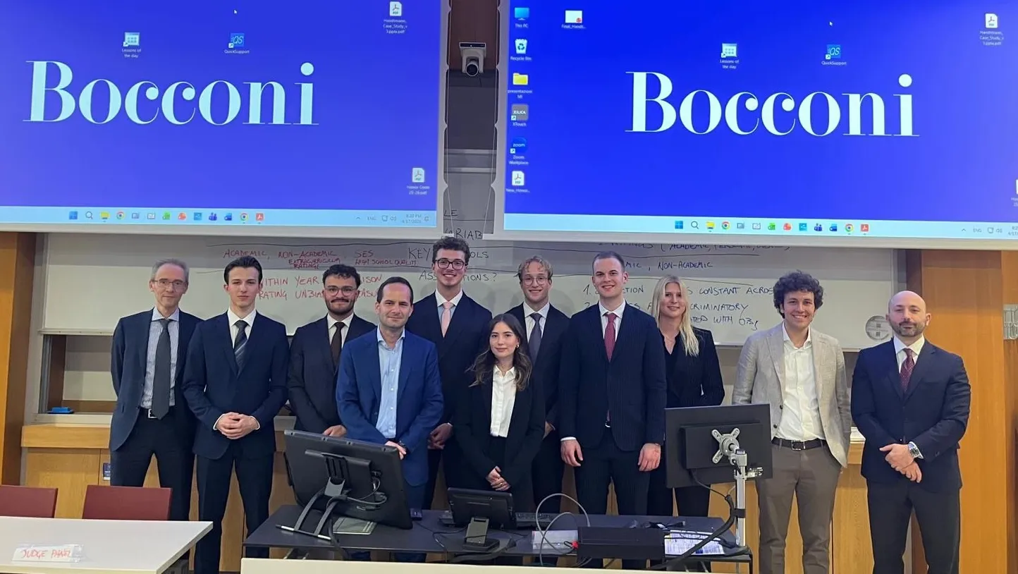 HSG team with the jury at the 5th Family Business Game, Bocconi University